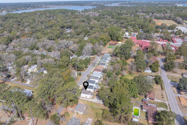 aerial view featuring a water view, a residential view, and a view of trees