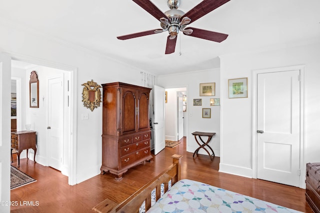117 Elliott St, Beaufort, SC 29902 - bedroom with ornamental molding, wood finished floors, baseboards, and a ceiling fan