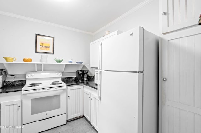 117 Elliott St, Beaufort, SC 29902 - kitchen featuring white appliances, open shelves, dark countertops, ornamental molding, and white cabinetry