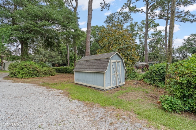117 Elliott St, Beaufort, SC 29902 - view of shed featuring view of wooded area