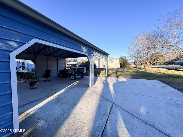 exterior space featuring concrete driveway