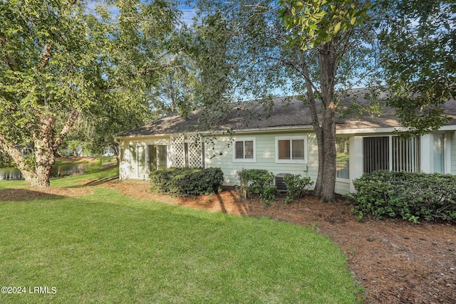 exterior space featuring a yard