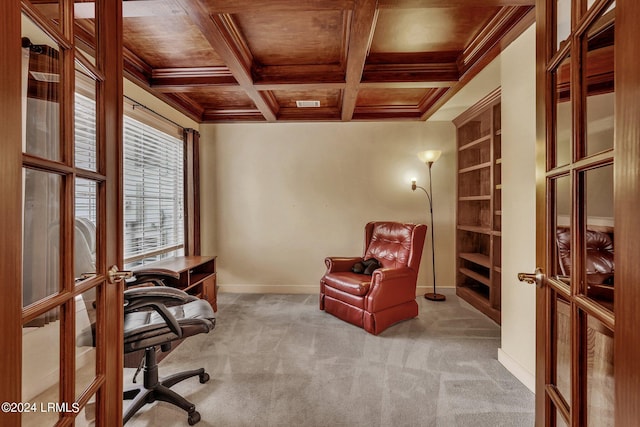 office area with wood ceiling, beam ceiling, carpet flooring, coffered ceiling, and ornamental molding