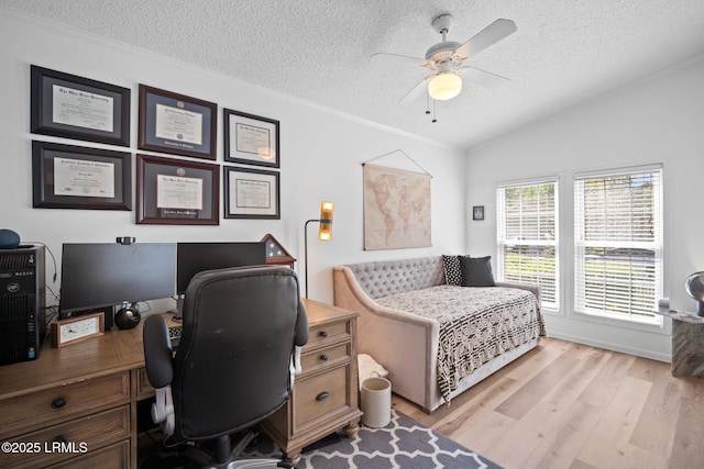 3 Stono Ct, Beaufort, SC 29902 - bedroom featuring a textured ceiling, light wood-type flooring, lofted ceiling, an office area, and a ceiling fan