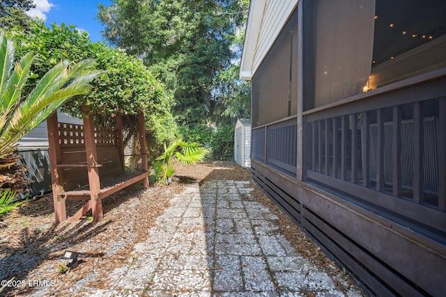 3 Stono Ct, Beaufort, SC 29902 - view of side of property with a patio and a shed