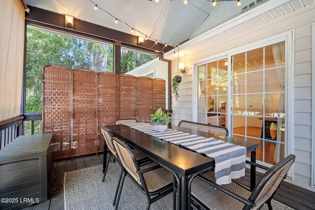 3 Stono Ct, Beaufort, SC 29902 - sunroom / solarium featuring vaulted ceiling, outdoor dining area, and track lighting