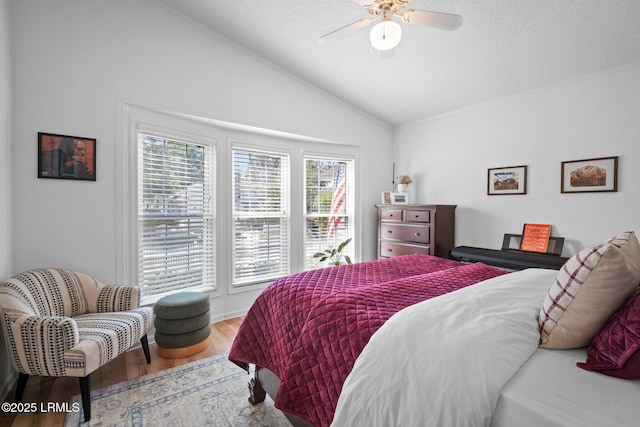 3 Stono Ct, Beaufort, SC 29902 - bedroom featuring vaulted ceiling, wood finished floors, a textured ceiling, and a ceiling fan