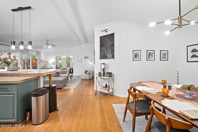3 Stono Ct, Beaufort, SC 29902 - dining space featuring light wood finished floors, a chandelier, and baseboards