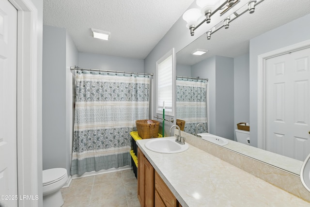 55 Broadland Cir, Bluffton, SC 29910 - full bathroom featuring vanity, a textured ceiling, and tile patterned flooring