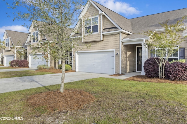 227 Wooden Wheel Ln, Okatie, SC 29909 - view of front of property featuring a garage, driveway, a front lawn, and a shingled roof