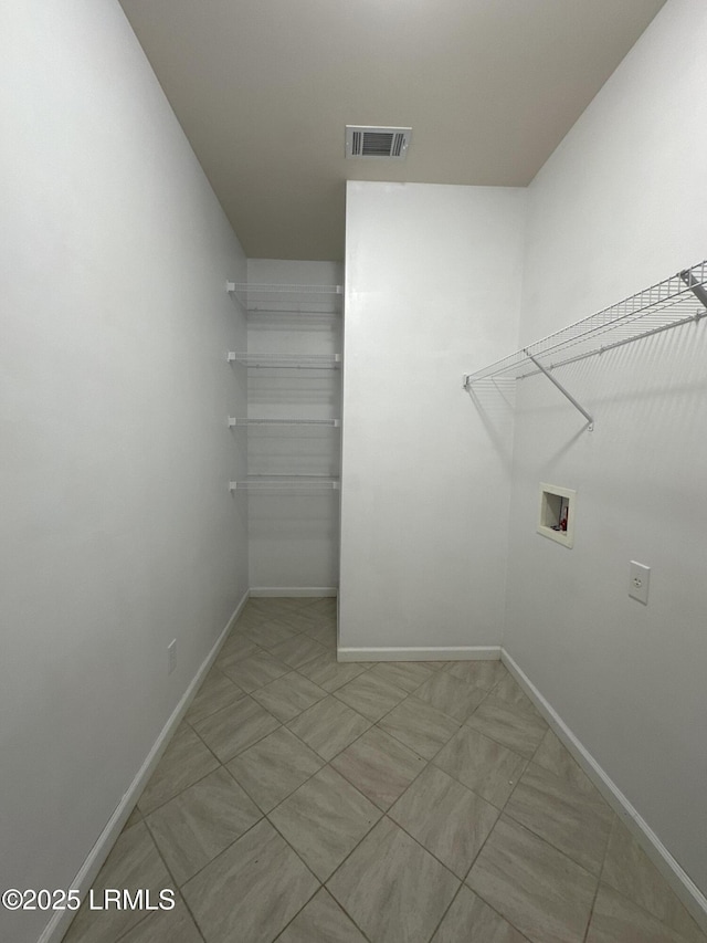 3 Enoree Way, Beaufort, SC 29906 - clothes washing area featuring washer hookup and baseboards
