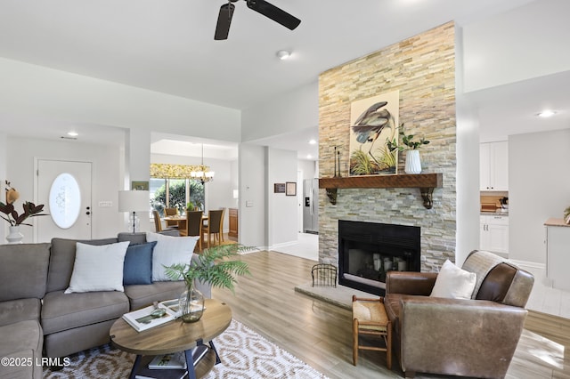 485 Bb Sams Dr, Saint Helena Island, SC 29920 - living area featuring light wood-style flooring, ceiling fan, a chandelier, a fireplace, and recessed lighting