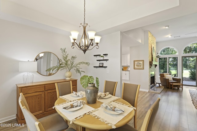 485 Bb Sams Dr, Saint Helena Island, SC 29920 - dining space featuring a chandelier and wood finished floors