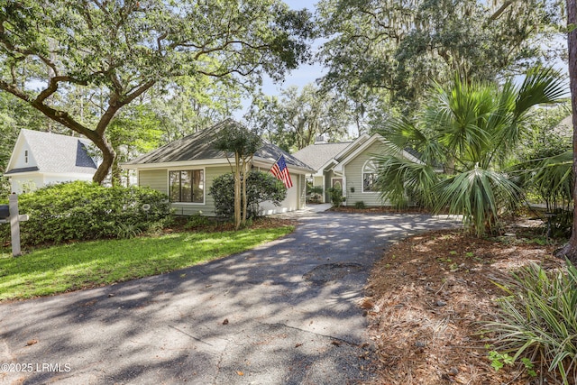 485 Bb Sams Dr, Saint Helena Island, SC 29920 - view of front facade with asphalt driveway and a garage