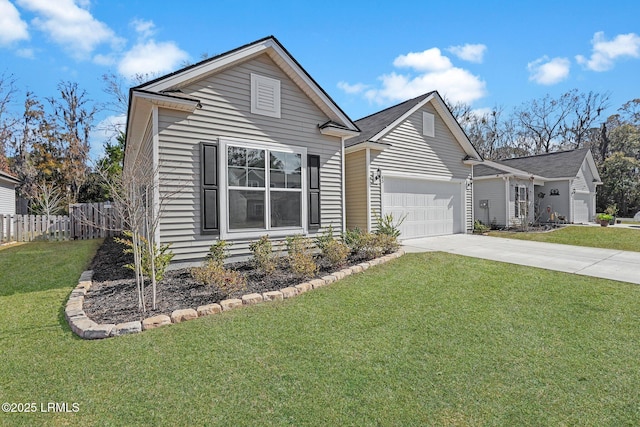 view of front facade with a garage and a front lawn