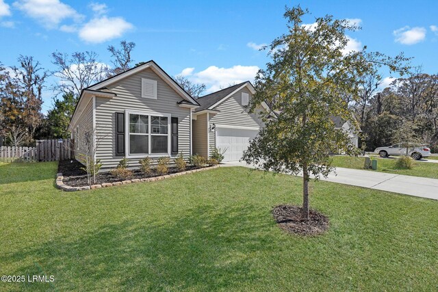 view of front facade with a garage and a front lawn