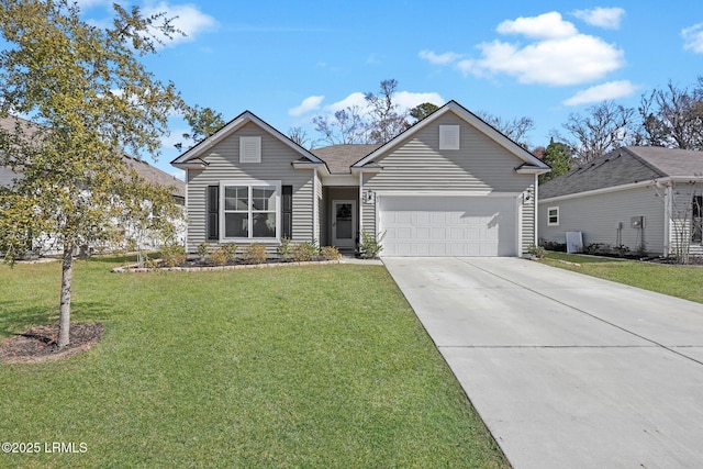 view of front of property featuring a garage and a front lawn