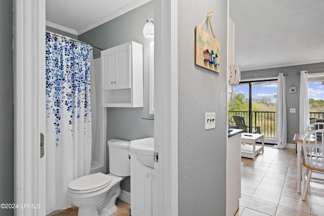 full bathroom with sink, tile patterned flooring, shower / tub combo, ornamental molding, and toilet