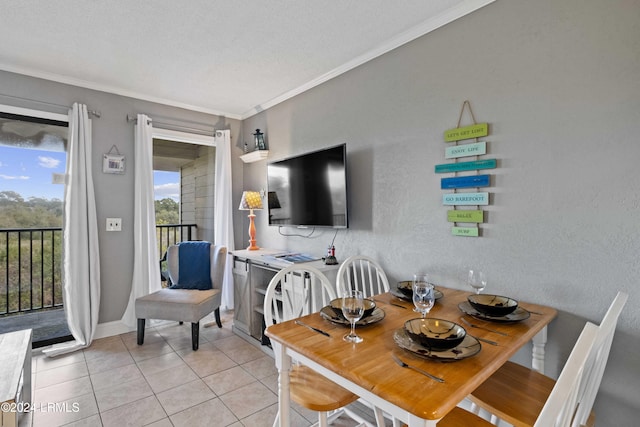 tiled dining room with crown molding