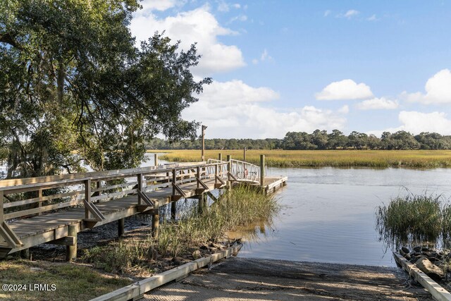 dock area featuring a water view