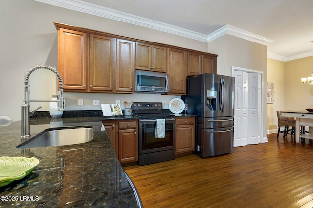 47 River Tree Cir, Bluffton, SC 29910 - kitchen with stainless steel appliances, dark wood-style floors, a sink, dark stone counters, and ornamental molding