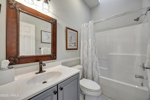 full bathroom with vanity, toilet, and shower / bath combo with shower curtain