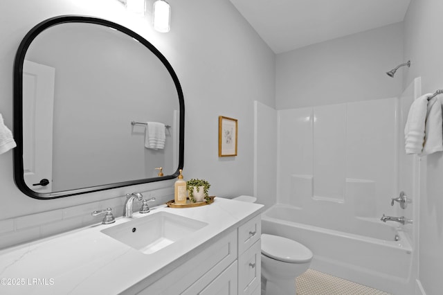 full bathroom with vanity, tile patterned floors, tub / shower combination, and toilet