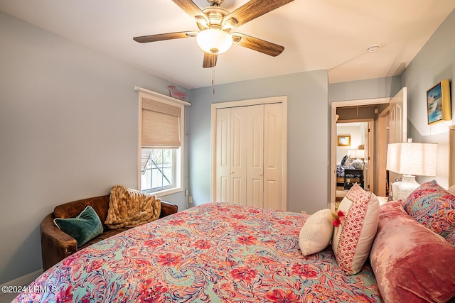 bedroom with ceiling fan and a closet