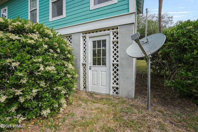 exterior details featuring brick siding