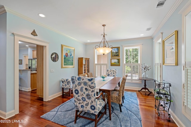 10 Old Barn Rd, Beaufort, SC 29907 - dining space featuring wood finished floors, crown molding, and recessed lighting