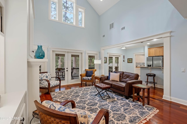 10 Old Barn Rd, Beaufort, SC 29907 - living area featuring french doors, high vaulted ceiling, healthy amount of natural light, and dark wood-style floors