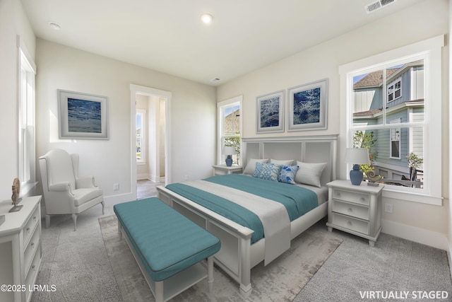 14 Skipperling Ct, Bluffton, SC 29909 - bedroom featuring light carpet and baseboards