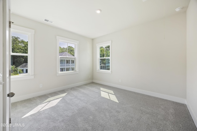 14 Skipperling Ct, Bluffton, SC 29909 - unfurnished room with carpet flooring, baseboards, and a smoke detector
