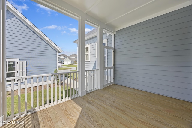 14 Skipperling Ct, Bluffton, SC 29909 - unfurnished sunroom with healthy amount of natural light and a residential view