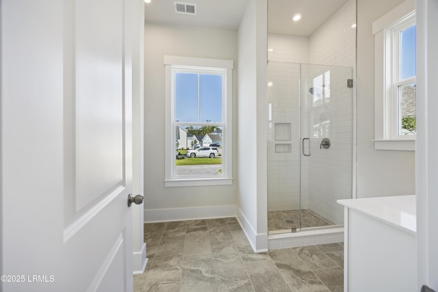 14 Skipperling Ct, Bluffton, SC 29909 - full bath featuring baseboards, a stall shower, vanity, marble look tile flooring, and recessed lighting