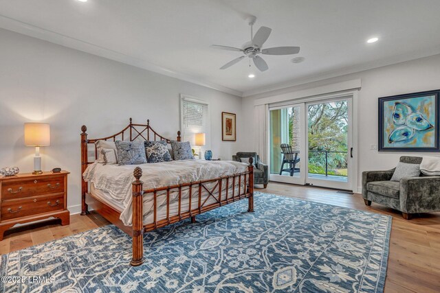 bedroom featuring hardwood / wood-style flooring, crown molding, access to exterior, and ceiling fan