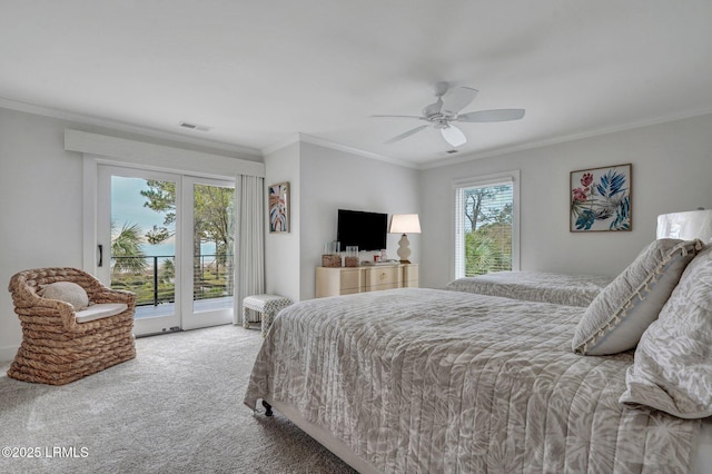 bedroom featuring multiple windows, carpet floors, access to outside, and ceiling fan