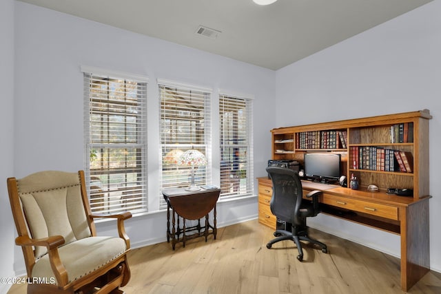 office space featuring light wood-type flooring