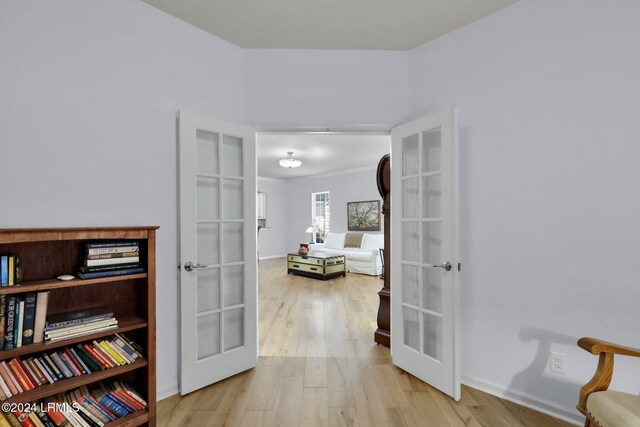 interior space featuring light hardwood / wood-style flooring and french doors