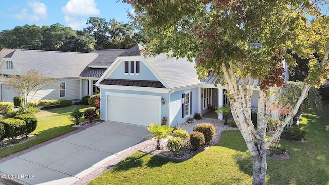 view of front facade featuring a garage and a front yard