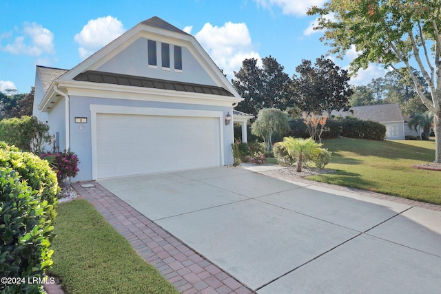 view of property exterior featuring a garage and a yard