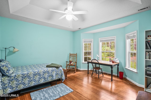 10 Woods Ln, Beaufort, SC 29907 - bedroom featuring wood finished floors, an office area, and ceiling fan