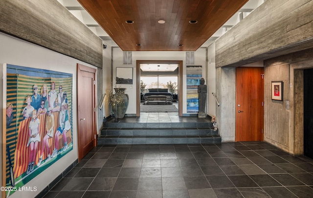 interior space featuring wood ceiling