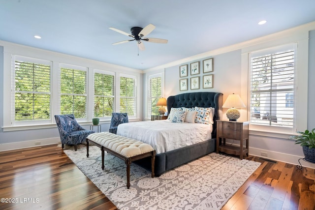 bedroom with hardwood / wood-style floors and ceiling fan