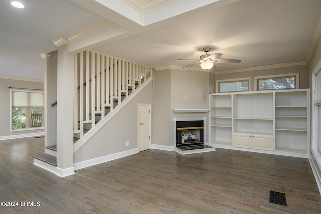 unfurnished living room featuring ornamental molding, dark hardwood / wood-style floors, and ceiling fan