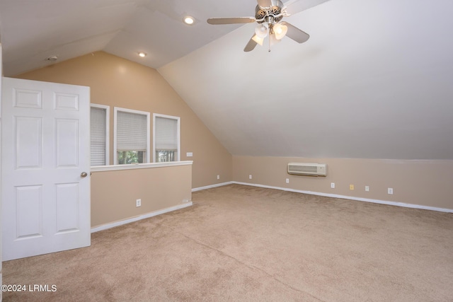 bonus room featuring ceiling fan, lofted ceiling, light carpet, and a wall unit AC