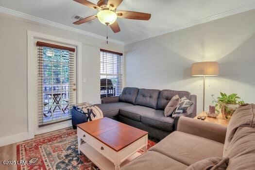 50 Pebble Beach Cv Unit F111, Bluffton, SC 29910 - living area featuring a ceiling fan, crown molding, and wood finished floors