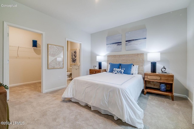 1549 Sanctum St, Ridgeland, SC 29936 - bedroom featuring carpet, a walk in closet, baseboards, and ensuite bathroom