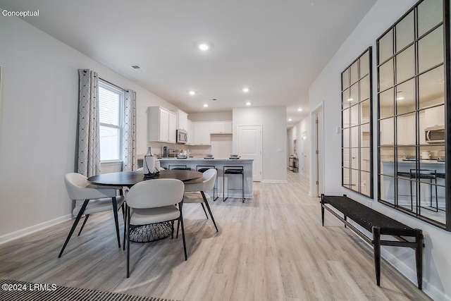 1549 Sanctum St, Ridgeland, SC 29936 - dining room with light wood finished floors, baseboards, and recessed lighting