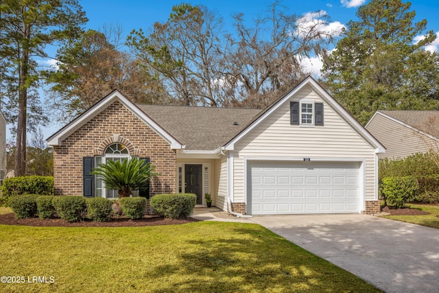 view of front facade with driveway, brick siding, roof with shingles, an attached garage, and a front yard